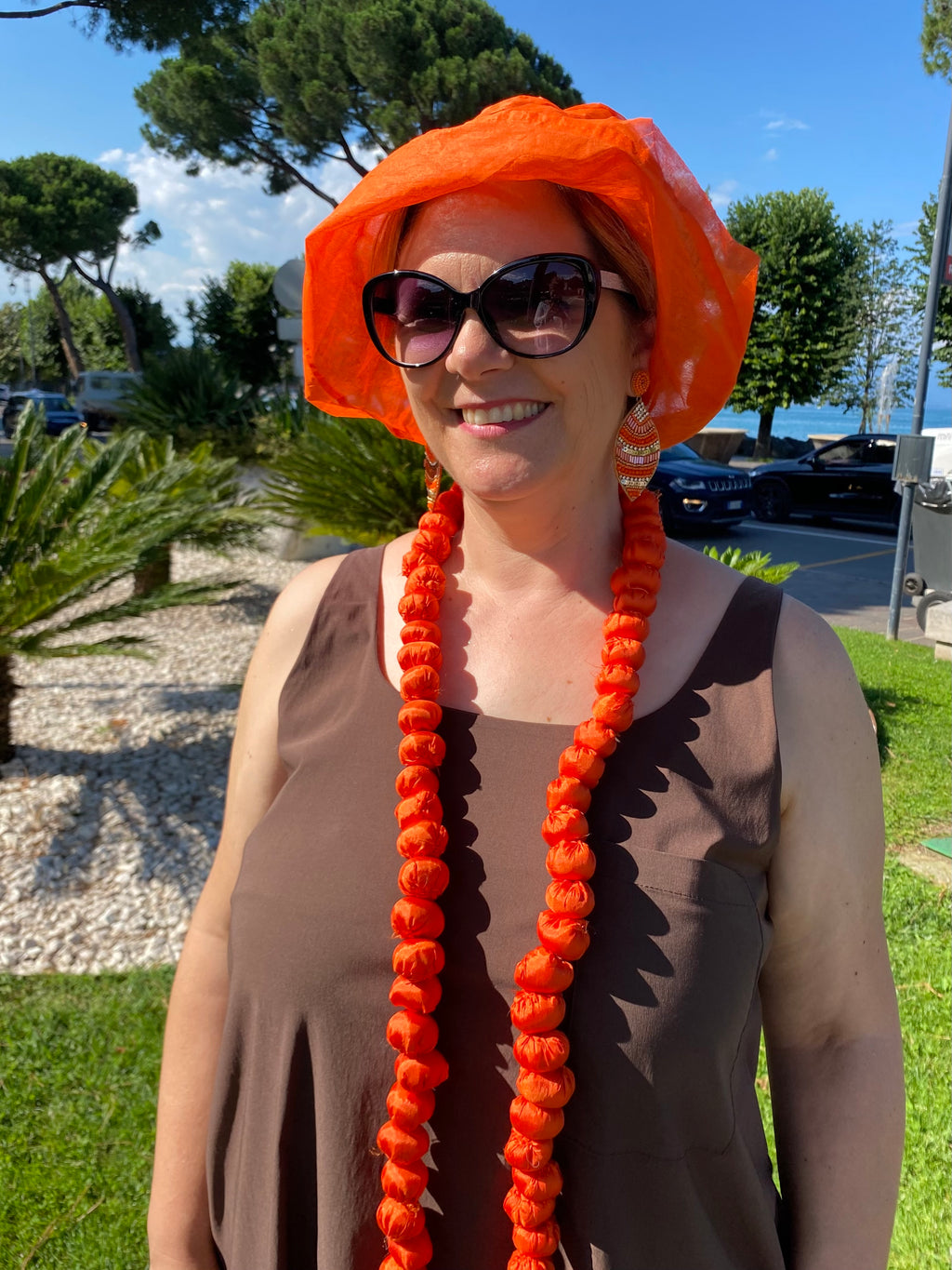 Cappellino arancio garzato tascabile