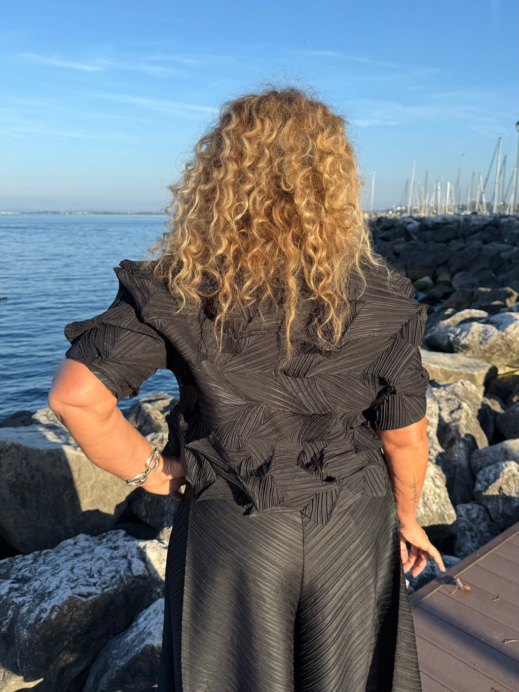 BLUSA IN PLISSÈ PIZZICATO NERA