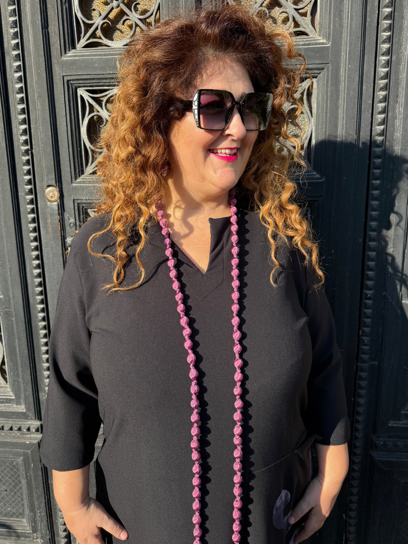 Abito nero con disegno