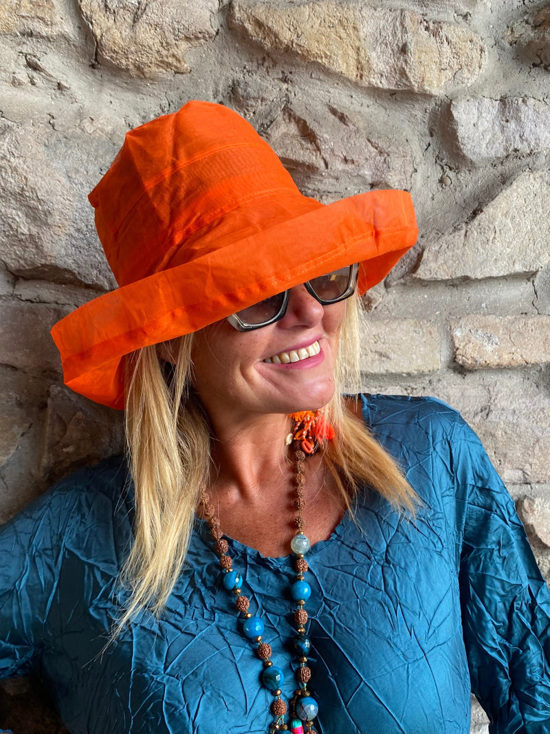Cappellino arancio garzato tascabile