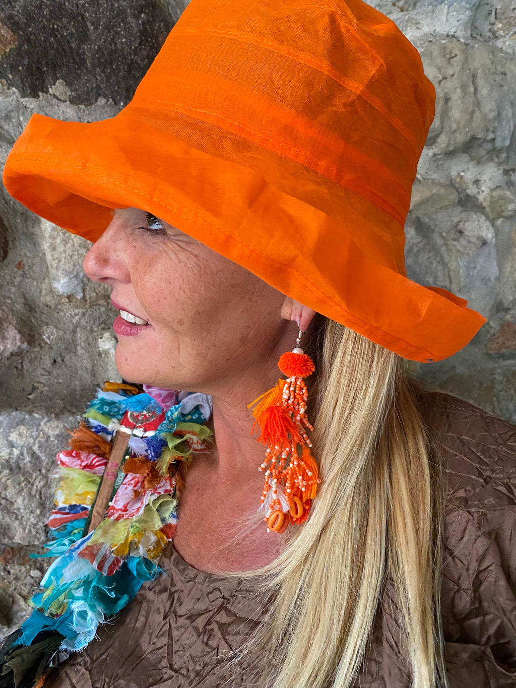 Cappellino arancio garzato tascabile