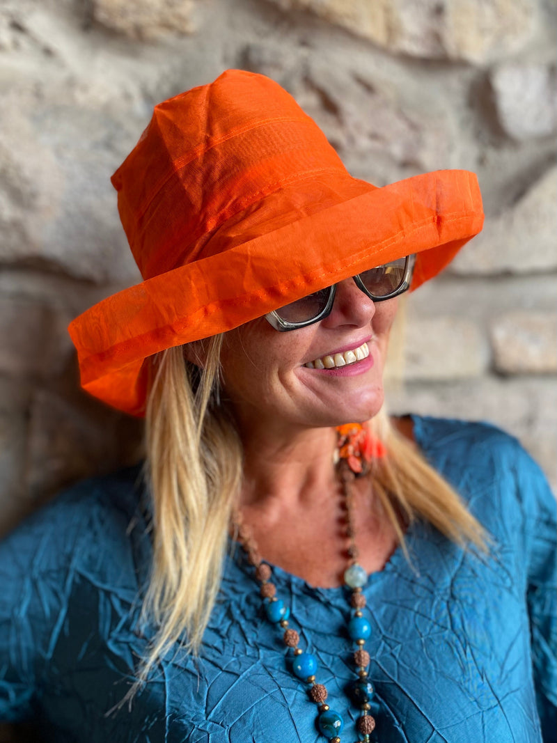 Cappellino arancio garzato tascabile